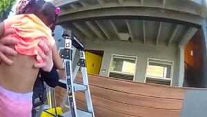 Dramatische Rettung: Polizisten fangen kleines Mädchen und Hund bei Wohnungsbrand auf