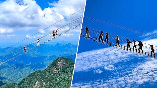 370 Meter in die Tiefe: Touristen klammern sich an steile Felstreppe im Osten Chinas