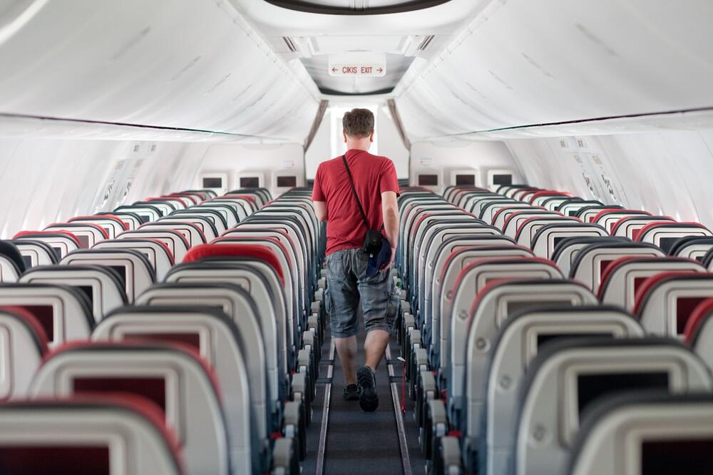 Passagier an Bord eines Flugzeugs