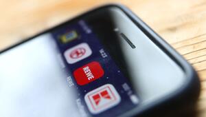 Icons der Apps verschiedener Handelsketten auf Smartphone