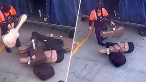 Null Respekt: Flughafenmitarbeiter wirft Gitarrenkoffer durch die Gegend