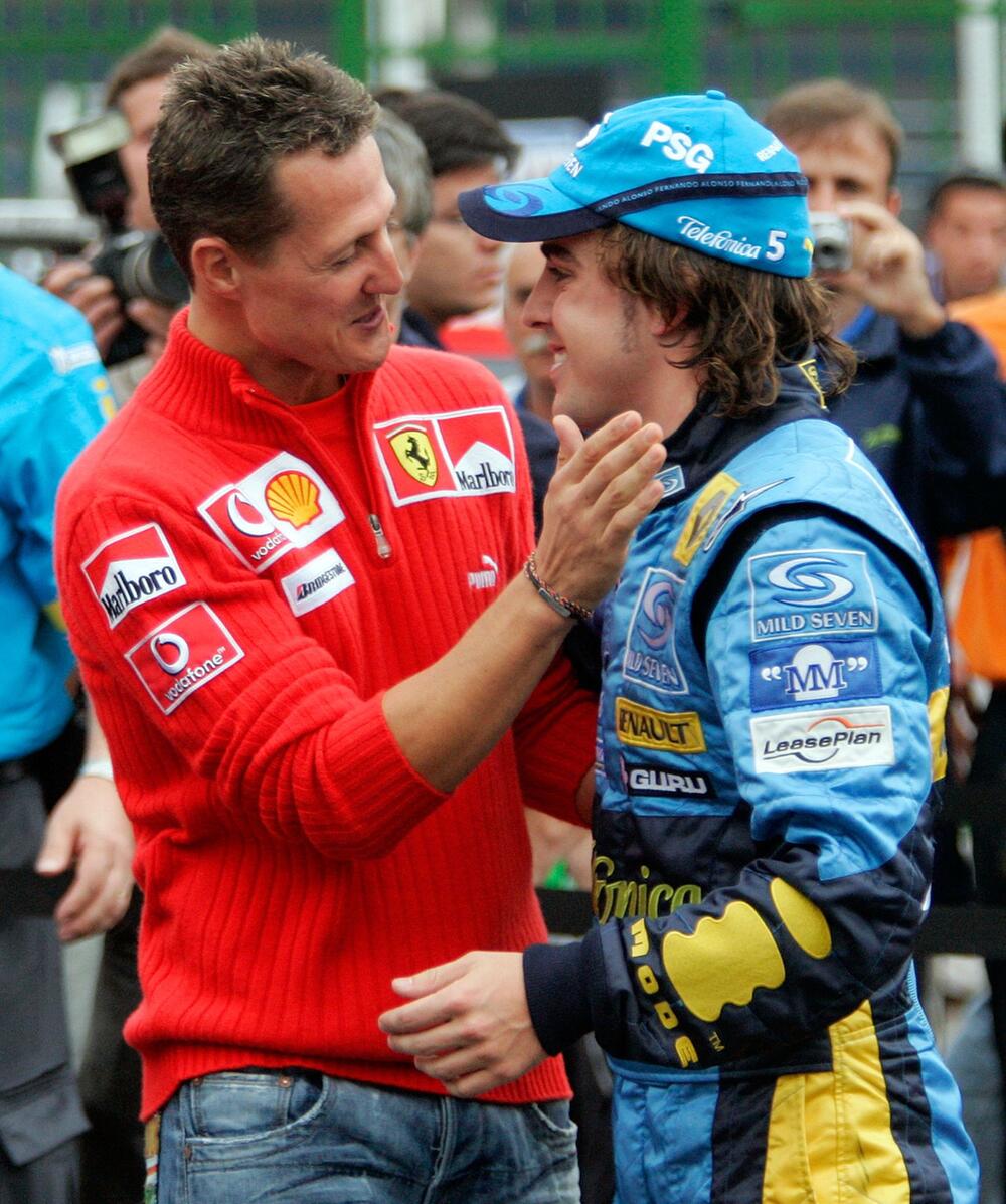 Fernando Alonso (r) und Michael Schumacher