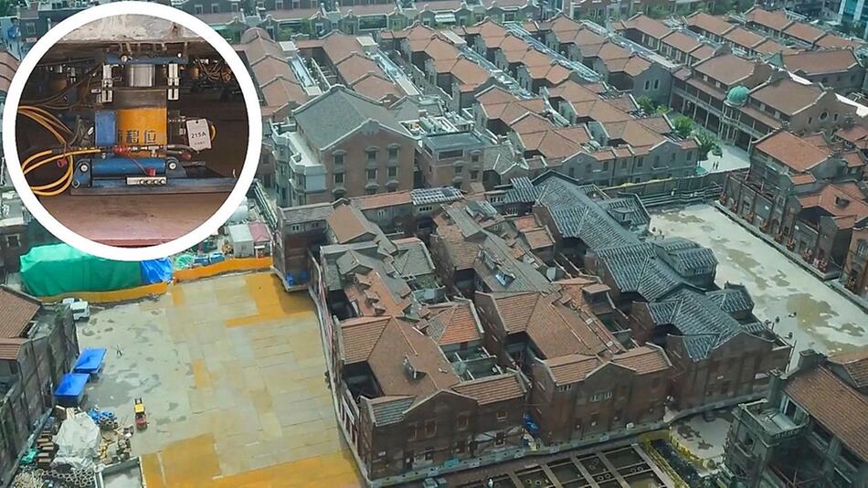 Roboterarmee bewegt kompletten Gebäudekomplex in Shanghai