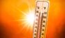 Fotokollage eines Thermometers in der Sommerhitze
