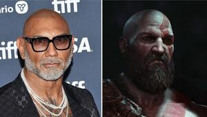 Dave Bautista neben der Computerspielfigur Kratos.