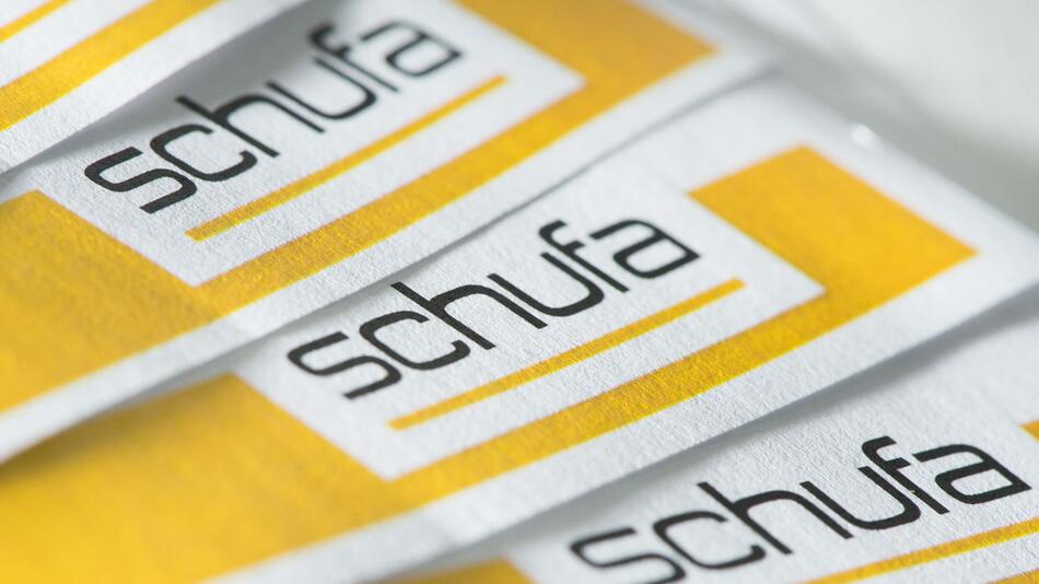 Das Schufa-Logo auf Papierbogen