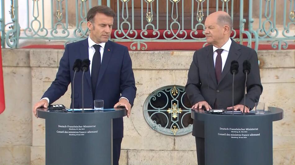 Emmanuel Macron (l.) und Olaf Scholz