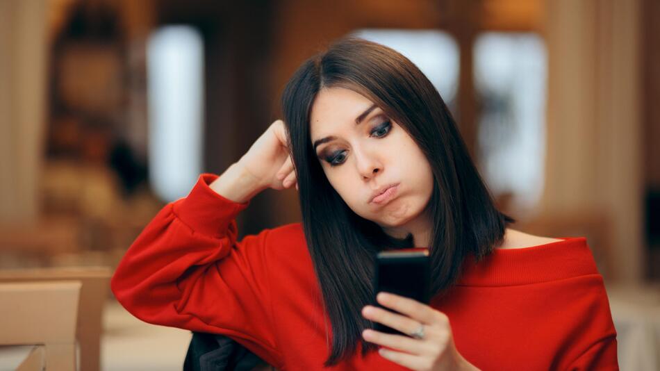 Frau mit Handy
