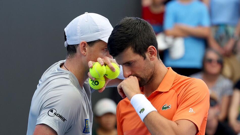 Novak Djokovic (r) und Vasek Pospisil