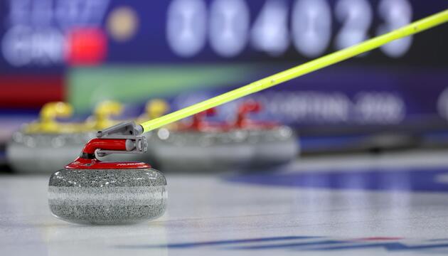 Rollstuhl-Curling-Stein