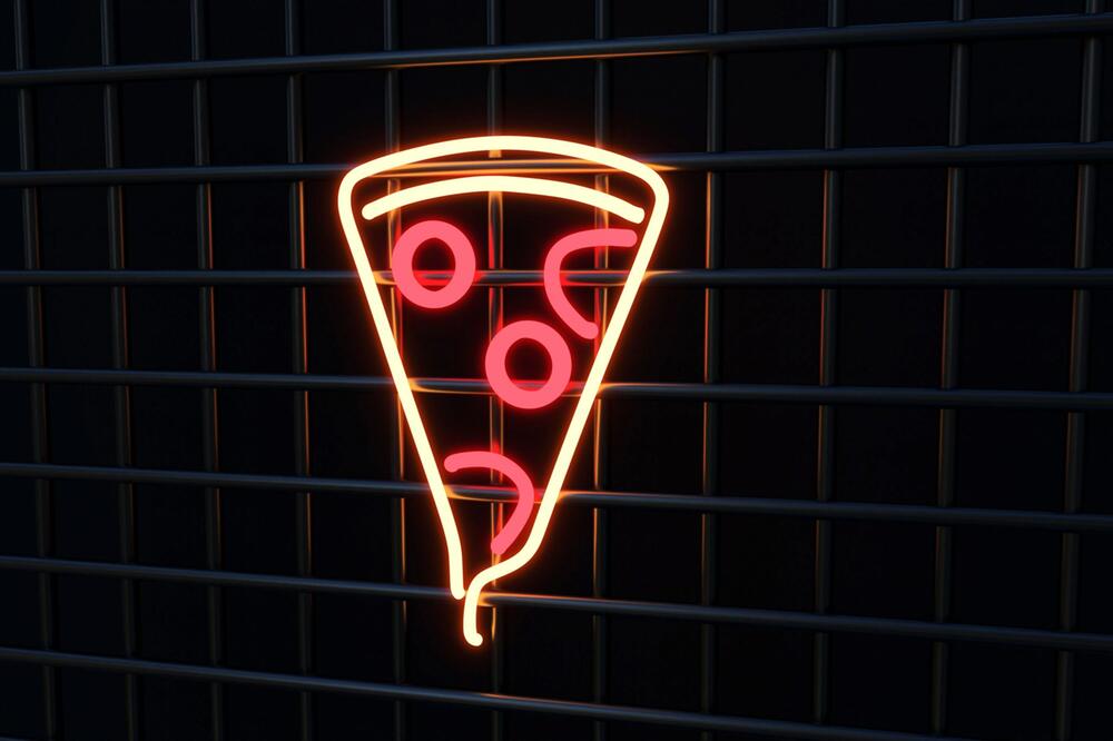 Ein Stück Pizza als Neon Licht