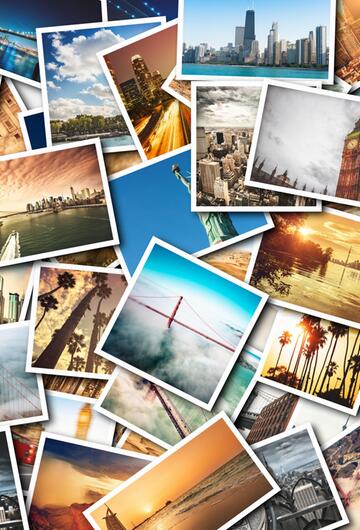 Postkarten mit Bildern von Städten.