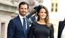 Prinz Carl Philip in dunklem Anzug mit Prinzessin Sofia im schwarzen Punktekleid