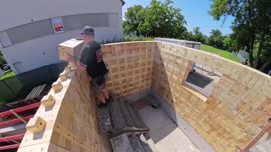 Mit Holzbausteinen gegen Treibhausgase im Bau
