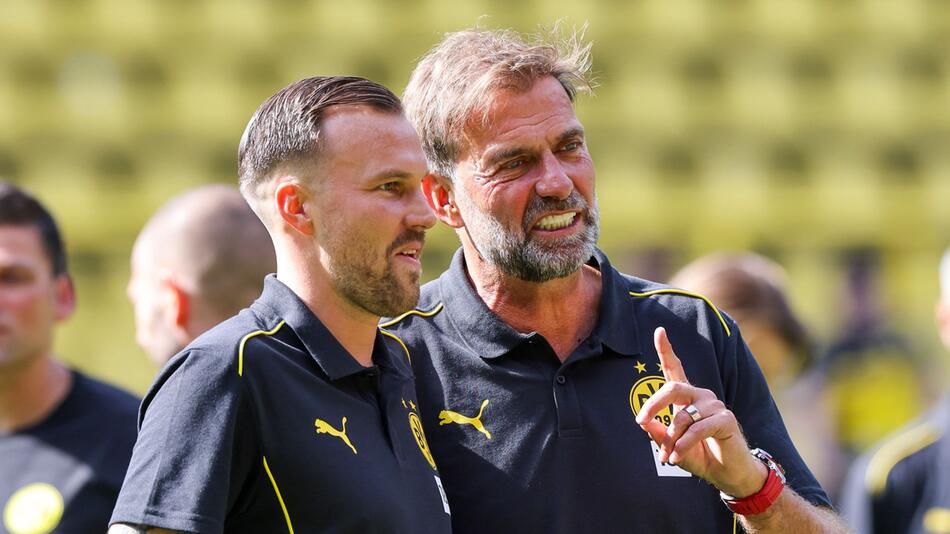 Kevin Großkreutz (l.) und Jürgen Klopp