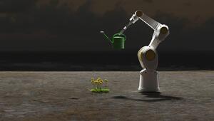 Roboter gießt eine Pflanze