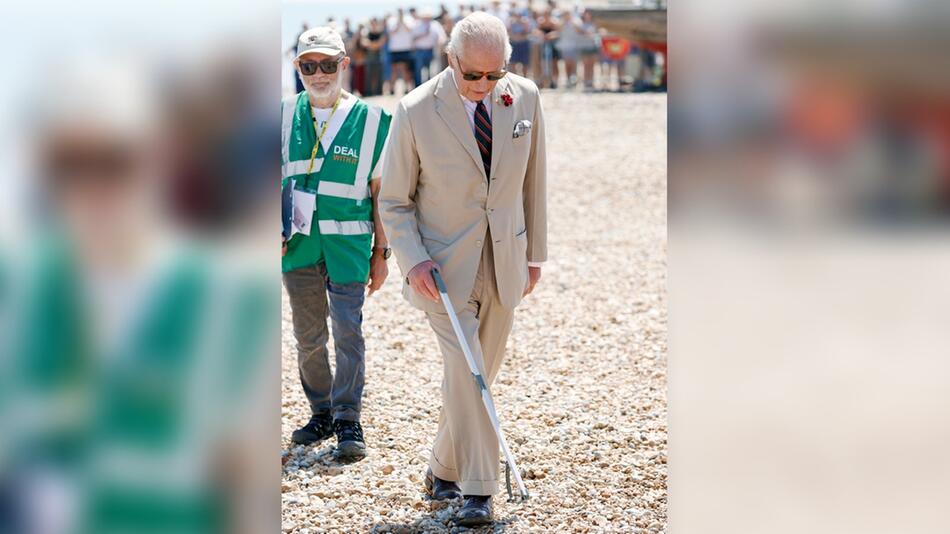 König Charles III. beim Müllsammeln in Kent.