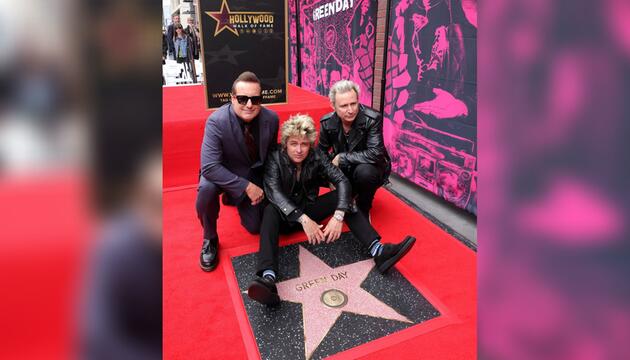 Stolz auf den Stern: Tré Cool, Billy Joe Armstrong und Mike Dirnt (v.l.n.r.) von Green Day.