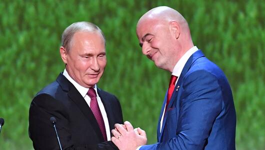 Wladimir Putin und Gianni Infantino