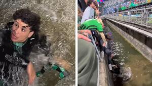 Fußballfan will aufs Spielfeld – und landet im Stadiongraben